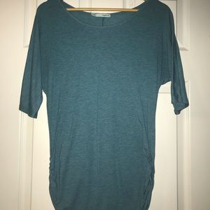 Teal fitted tunic with cinched sides
